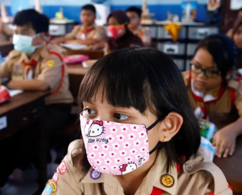 Indonesia's national motto is 'unity in diversity' but schoolgirls across the archipelago told a rights group they felt bullied into confirming with Islamic dress codes in the classroom [File: Ajeng Dinar Ulfiana/Reuters]
