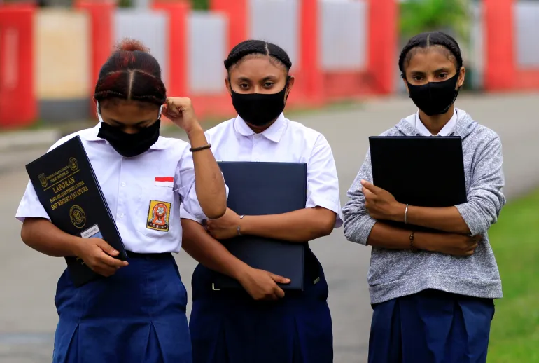 While mostly Muslim, Indonesia has a hugely diverse population, including Christians, Hindus and people following animist beliefs. State schools were banned from enforcing religious dress codes on students after a parent said a school was forcing his daughter – a Christian – to wear a headscarf [File: Gusti Tanati/Antara Foto via Reuters]
