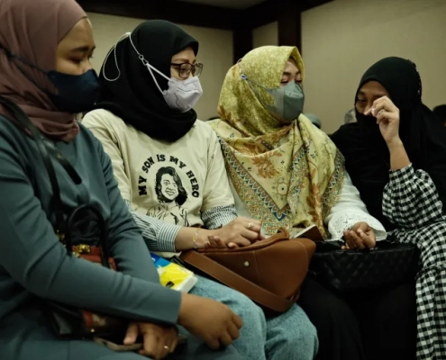 Siti Suhardiyati, Safitri Pusparani, Solihah and Desi Permata Sari say they have found comfort in each other, as they seek justice for their children [Jessica Washington/Al Jazeera]