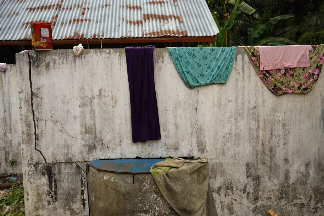 One woman likened the shelter to a 'prison', with nothing to do but chores like laundry, while having no certainty about what the future holds. [Jessica Washington/Al Jazeera]